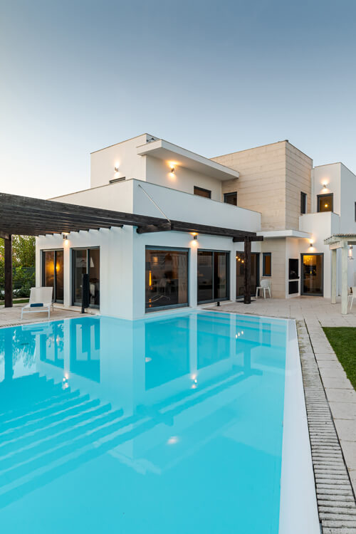 Modern House With Garden Swimming Pool And Wooden Pergula